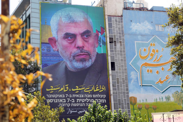 Business City News Posters featuring Hamas' new political chief Sinwar in Tehran 