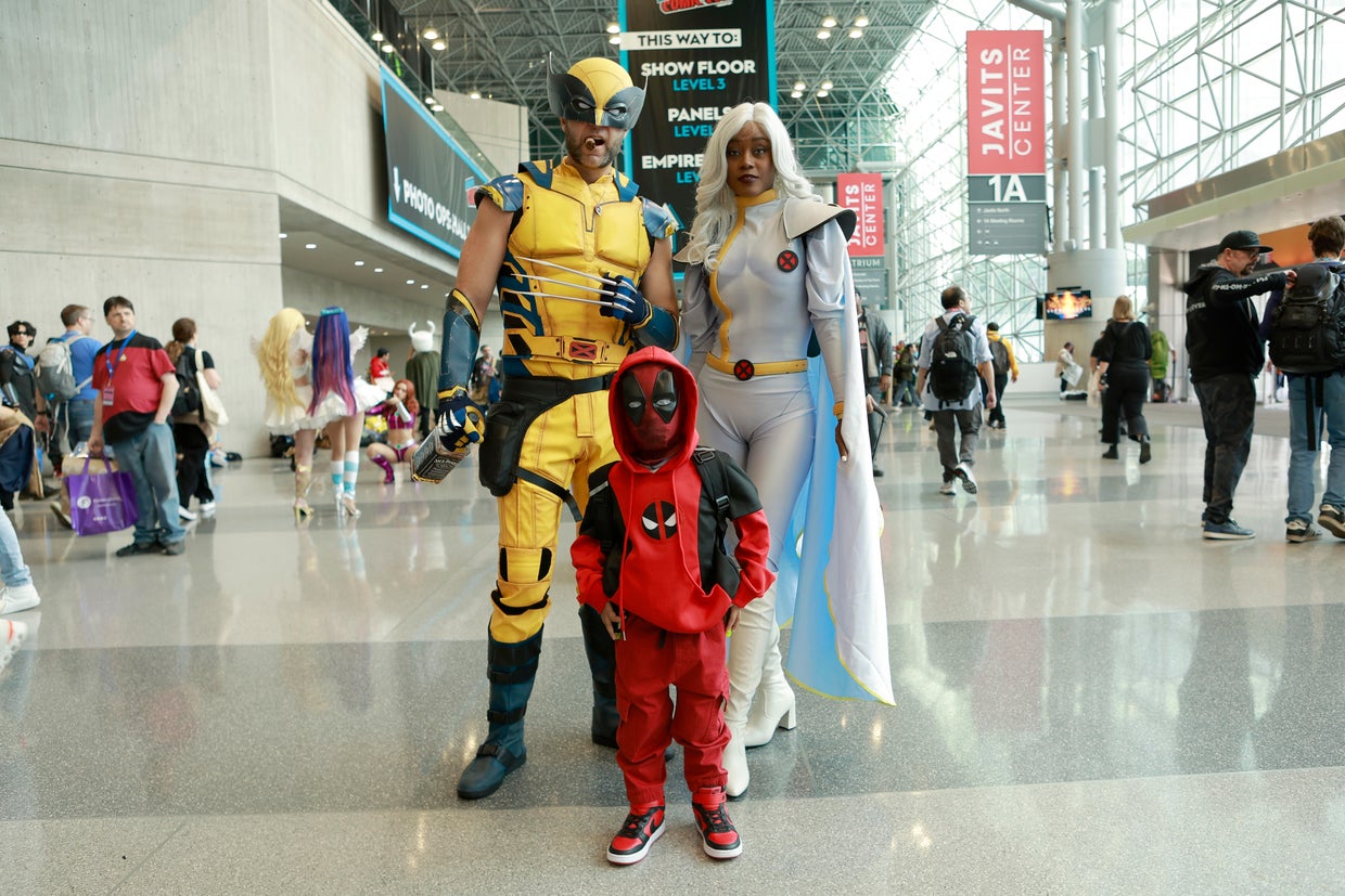 Cosplayers pose as Wolverine, Deadpool and Storm during New York Comic Con 2024 at The Jacob K. Javits Convention Center on October 17, 2024 in New York City.