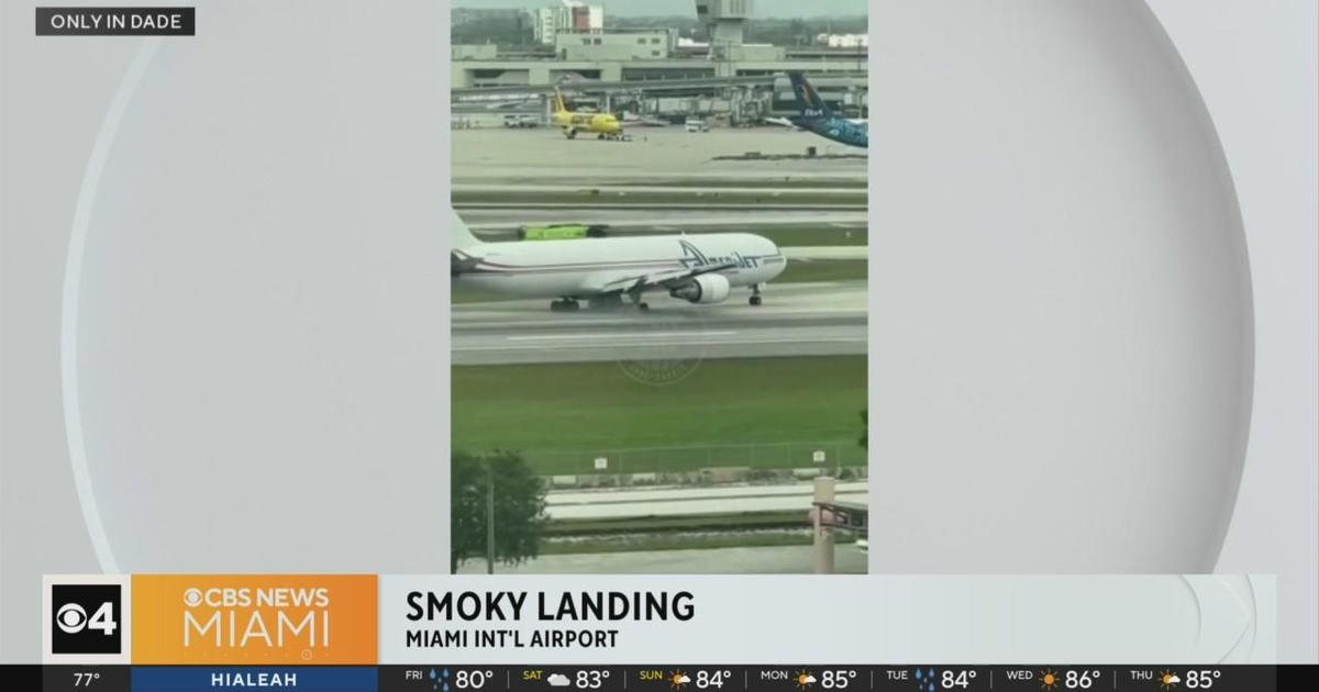 Amerijet cargo plane makes smoky landing at Miami International Airport