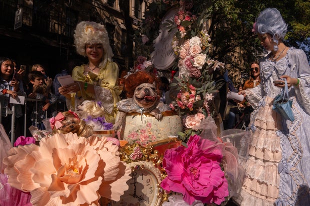 People and their dogs in costume take part in the 34th Annual Tompkins Square Park Halloween Dog Parade in New York City, October 19, 2024.