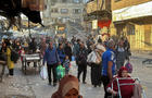 Displaced Palestinians flee Beit Lahiya amid an Israeli military operation in the northern Gaza Strip 