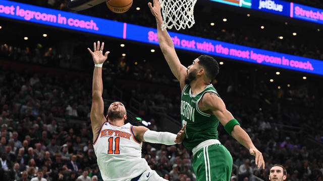 Jalen Brunson #11 of the New York Knicks shoots against Jayson Tatum #0 of the Boston Celtics in the second quarter at TD Garden on October 22, 2024 in Boston, Massachusetts. 