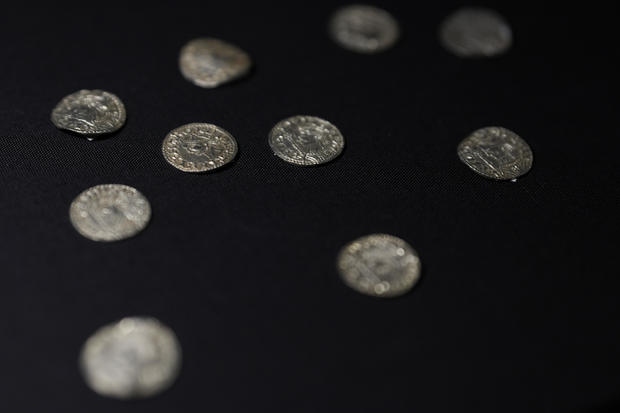 A selection of coins dating from the time around the Norman Invasion of Britain in 1066, which are part of the Chew Valley Hoard of 2,584 coins, are seen on display at the British Museum in London, Oct. 22, 2024. 