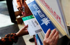 A voter puts their ballot into a drop box in Pennsylvania 