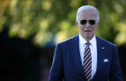 President Biden talks briefly with reporters as he departs the White House on October 24, 2024 in Washington, DC. 