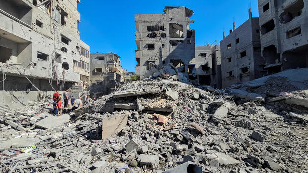 Aftermath of Israeli strikes on houses and residential buildings, in Beit Lahiya, in the northern Gaza Strip 