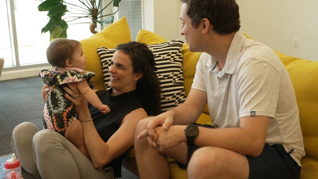 Dani Mathisen with her husband and baby