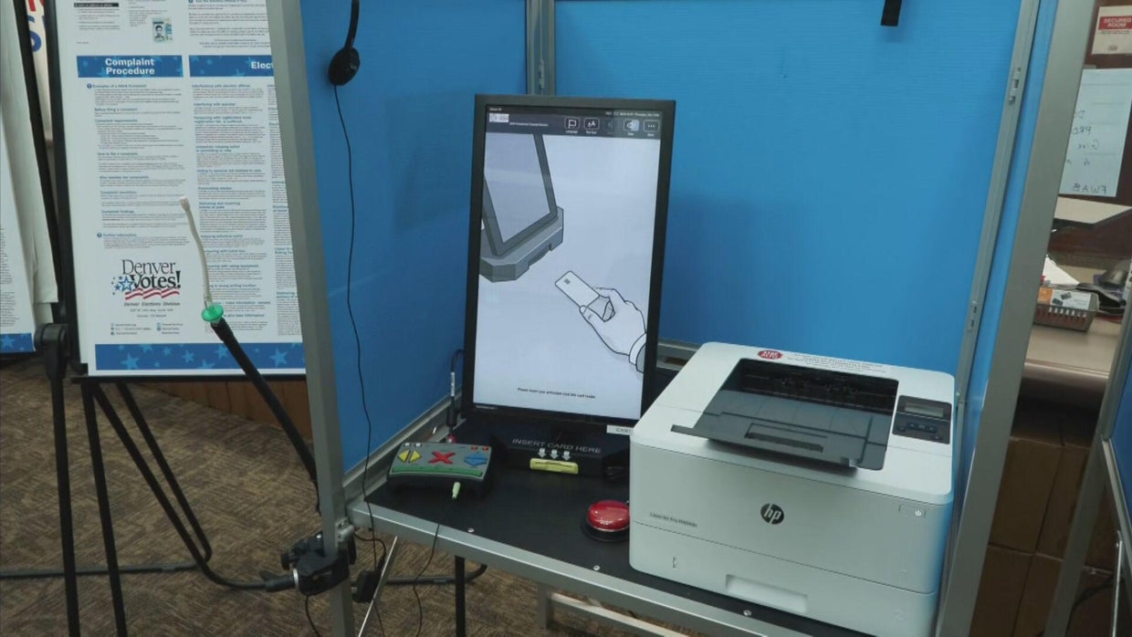 Coloradans with disabilities use special equipment to vote without ...
