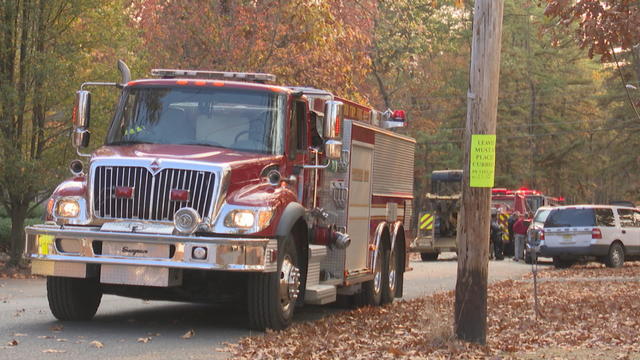 A fire truck is seen in a staging area in Waterford Township 