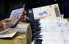 Election worker in Pennsylvania processes mail-in and absentee ballots 