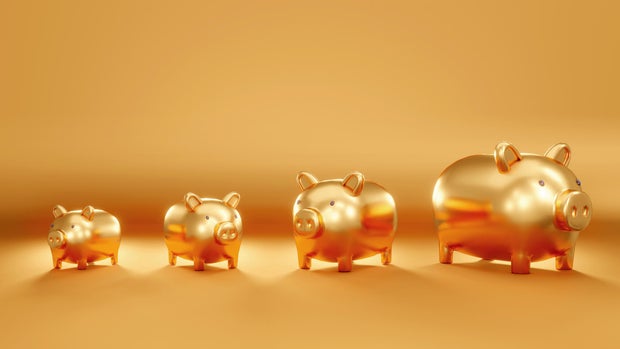 3D Rendering concept of saving golden piggy banks lining from small to big but turn in different direction on golden background for commercial design. 3D Render.