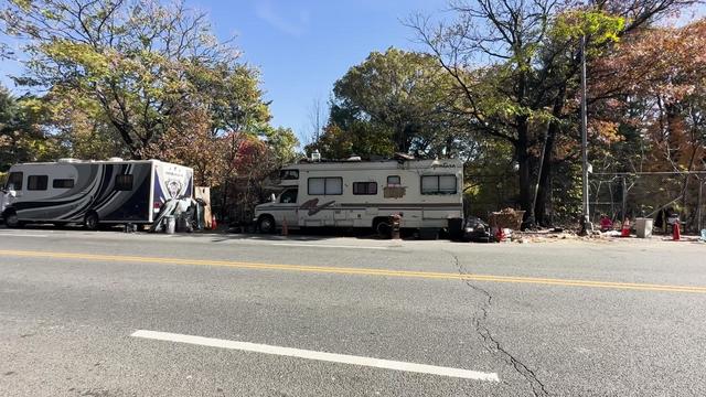 Two abandoned RVs parked along Webster Avenue in the Bronx. 