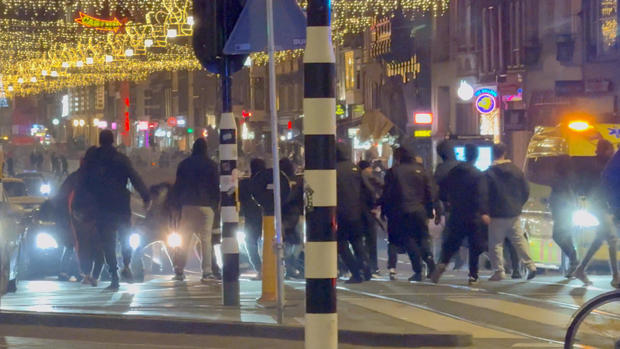 Israeli football supporters and Dutch youth clash near Amsterdam central station, in Amsterdam, Netherlands, Nov. 8, 2024, in this still image obtained from a social media video. 