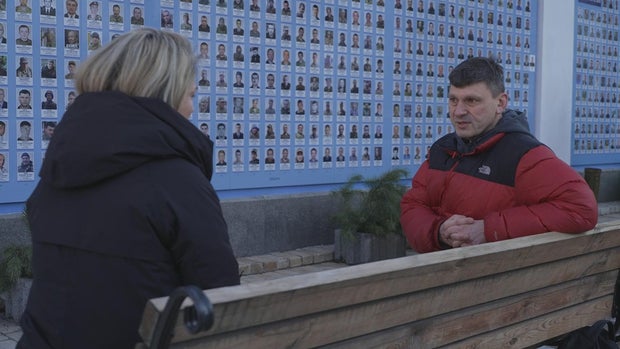 Holly Williams and Andriy Tsaplienko at the Wall of Remembrance