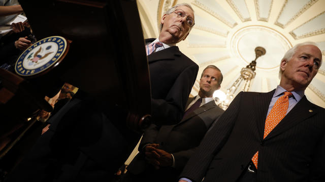 Senate Majority Leader Mitch McConnell, accompanied by Sens. John Thune and John Cornyn, speaks with reporters ahead of the weekly policy luncheons on Capitol Hill September 18, 2018 in Washington, DC. 