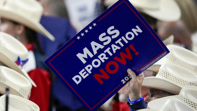 A member of the Texas delegation holds a sign during the Republican National Convention July 17, 2024, in Milwaukee. 