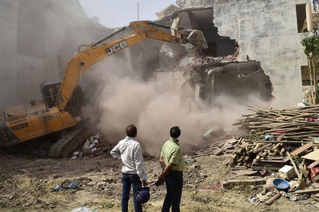 INDIA-POLITICS-RELIGION-BULLDOZER 