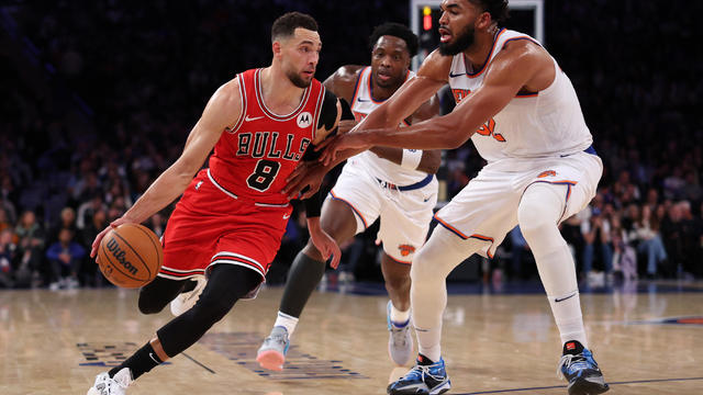 Zach LaVine #8 of the Chicago Bulls drives to the basket against Karl-Anthony Towns #32 of the New York Knicks during the fourth quarter at Madison Square Garden on November 13, 2024 in New York City. 