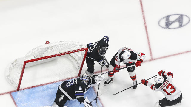 Goalie Andrei Vasilevskiy #88 of the Tampa Bay Lightning makes a save against Nico Hischier #13 of the New Jersey Devils during the second period at Amalie Arena on November 16, 2024 in Tampa, Florida. 