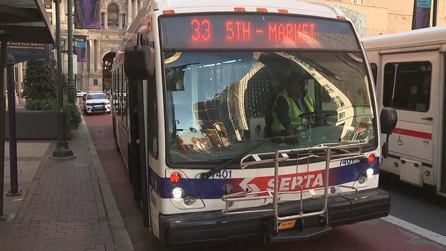 Two SEPTA buses are seen on the road 