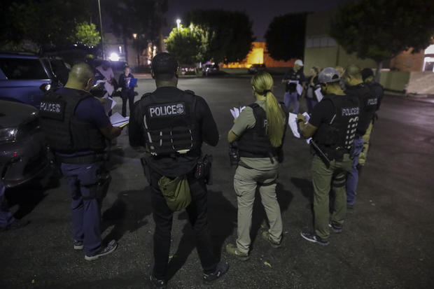 ICE agents raid to arrest illigal immigrants. 