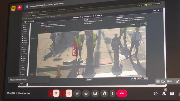 A computer screenshot showing how the system puts a red box around a potential gun seen on a surveillance video feed 