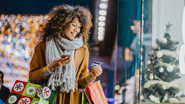 Young woman shopping for Christmas 