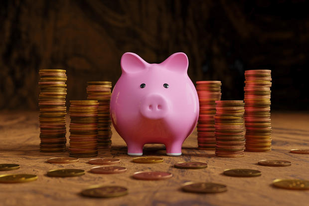 Piggy Bank and Stack of Coins 