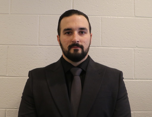 Warren police officer charged with homicide in deadly crash that killed two men