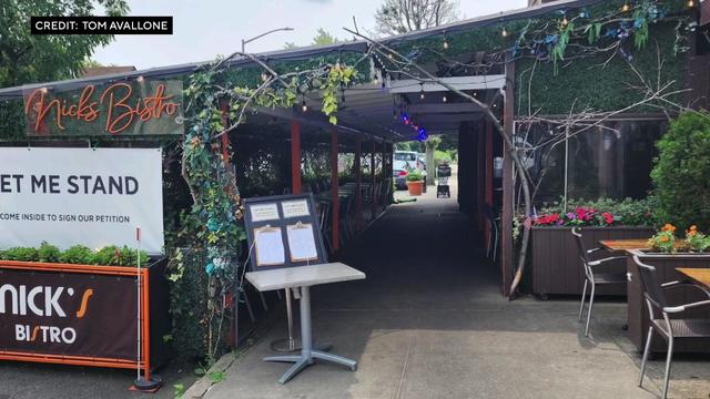 A large, elaborate outdoor dining shed at Nick's Bistro in Forest Hills. 