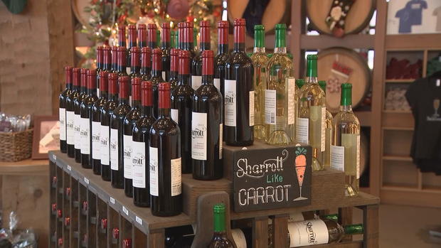 Wine for sale is seen at Sharrott Winery. A sign says Sharrott like carrot 