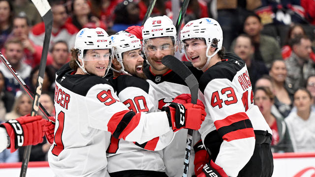 Tomas Tatar #90 of the New Jersey Devils celebrates with teammates after scoring in the first period against the Washington Capitals at Capital One Arena on November 23, 2024 in Washington, DC. 