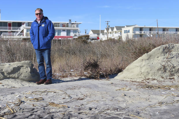 Mayor Patrick Rosenello stands next to a destroyed section of sand dune in North Wildwood N.J. on Jan. 22, 2024. 