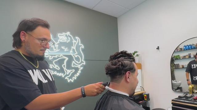 Juan Carlos Montemayor, owner of Wolves and Shears Barbershop, 