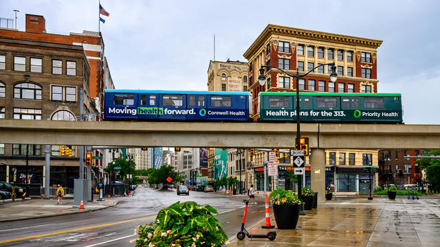 The monorail train in the downtown district. Cityscape and 