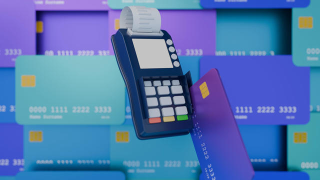 Credit card reader in use, background filled with credit cards, render 