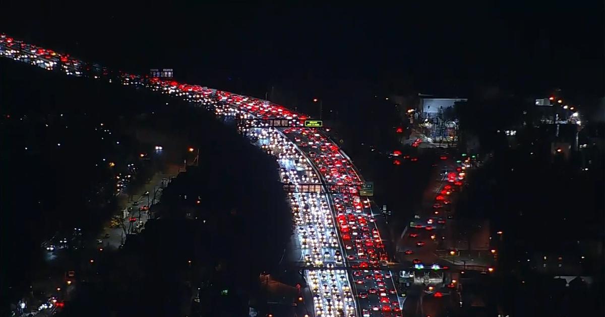 Americans pack the roads, airports for Thanksgiving travel