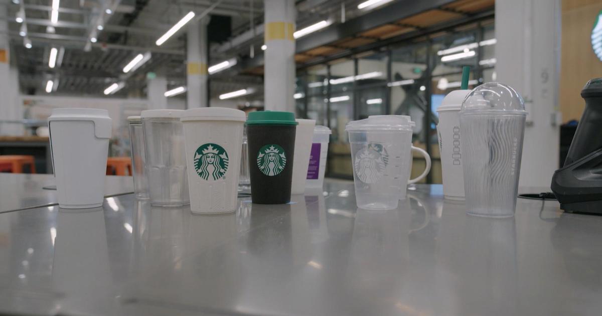 CBS News investigation finds some Starbucks cups placed in recycling bins end up in landfills