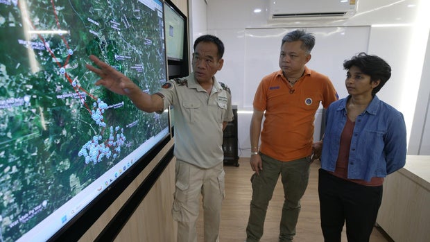 wildlife researcher Boripat Siriaroonrat at a command centter