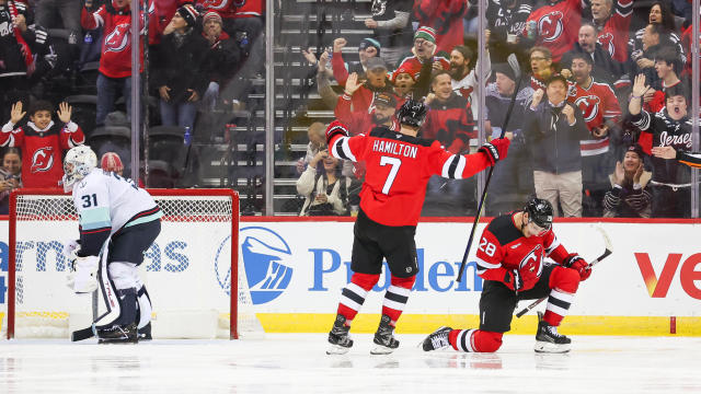 New Jersey Devils right wing Timo Meier (28) celebrates with New Jersey Devils defenseman Dougie Hamilton (7) after scoring a goal during a NHL game between the Seattle Kraken and New Jersey Devils at Prudential Center on December 6, 2024 in Newark, New Jersey. 