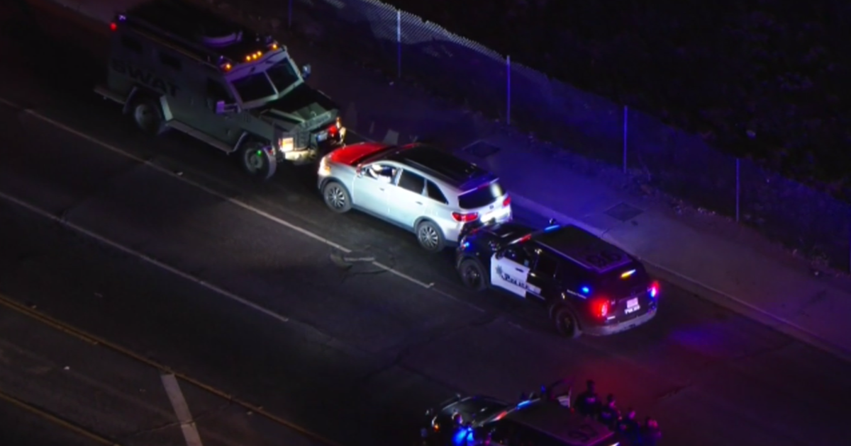 Man wanted for brandishing weapon surrenders after lengthy chase, brief standoff in San Bernardino