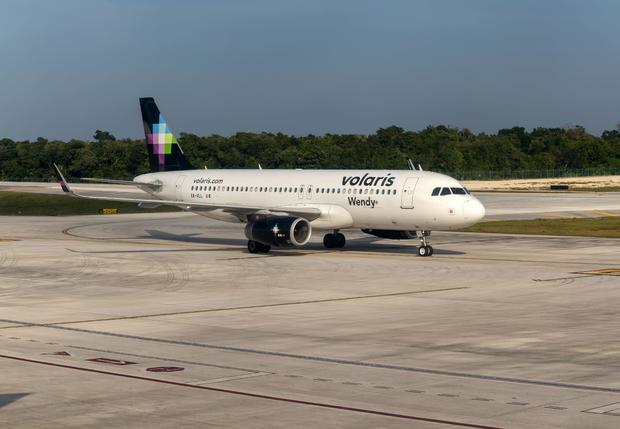 Volaris airline Airbus A320-233 plane at Cancun airport, Quintana Roo, Yucatan Peninsula, Mexico 