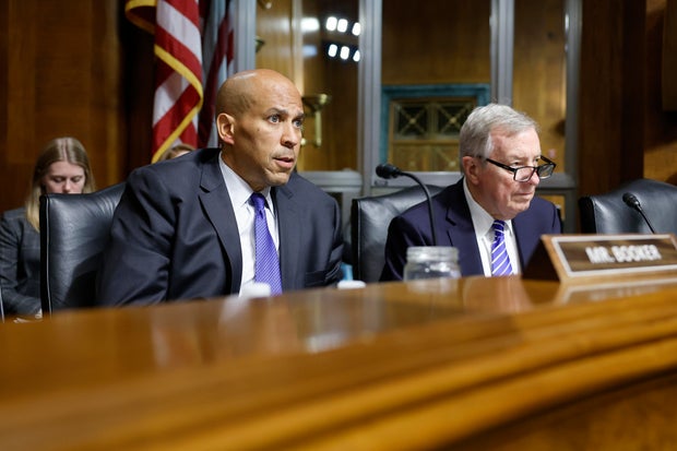 Senator Cory Booker and Senator Dick Durbin listen during a hearing with the Senate Judiciary Subcommittee on Capitol Hill on June 12, 2024 in Washington, DC.