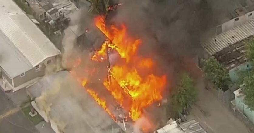 Intense fire burns at NW Dade mobile home park