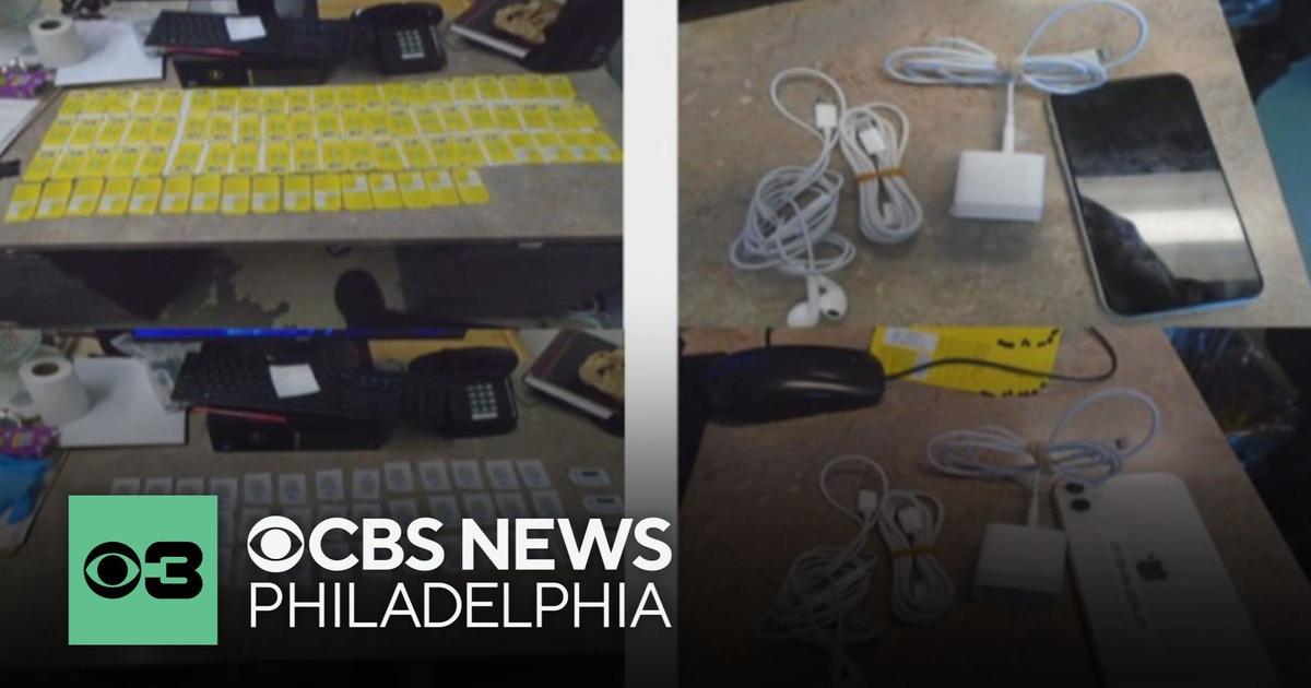 Two Philadelphia correctional officers have been arrested for smuggling contraband into the correctional facility