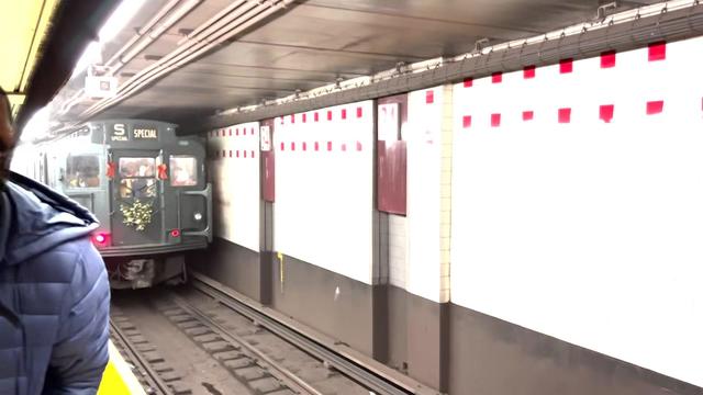 A vintage subway train leaves the 34th Street-Herald Square subway station. 