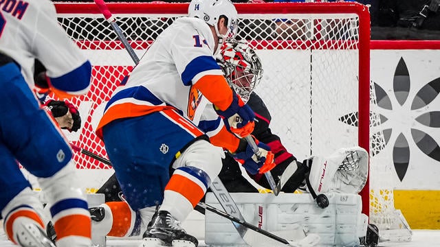 Pyotr Kochetkov #52 of the Carolina Hurricanes makes a save during the first period against the New York Islanders at Lenovo Center on December 17, 2024 in Raleigh, North Carolina. 