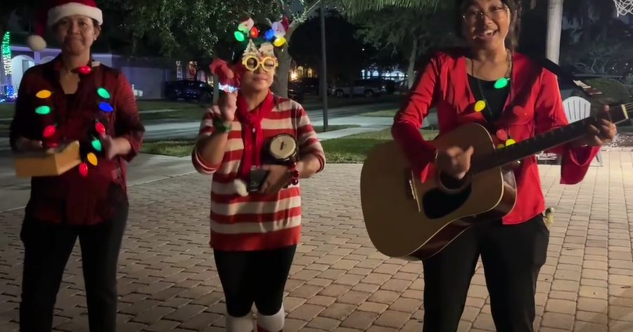 Their voices, instruments are holiday cheer Their voices, instruments are holiday cheer