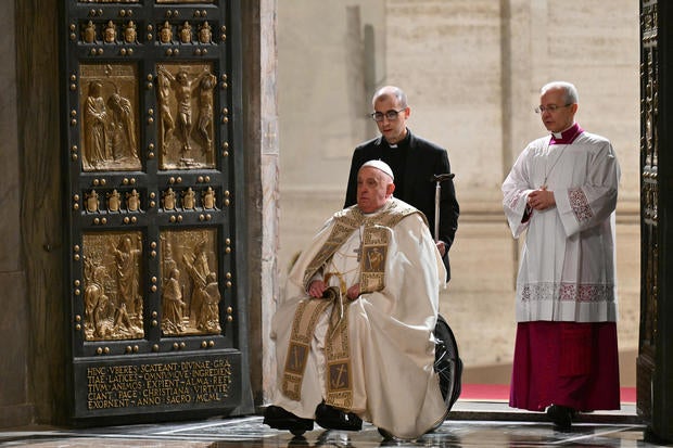 Pope Francis opens the Holy Door of St. Peter's Basilica in the Vatican 