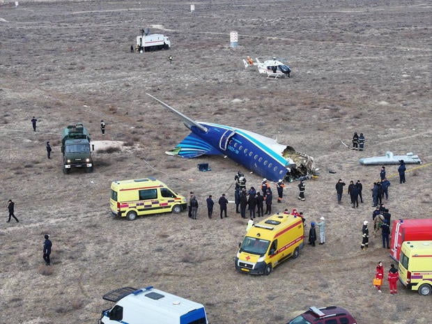 A drone view shows the crash site of a passenger plane near Aktau 